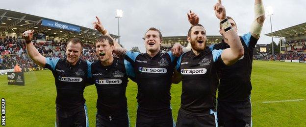 Glasgow players celebrate their maiden Pro12 title victory after a splendid performance