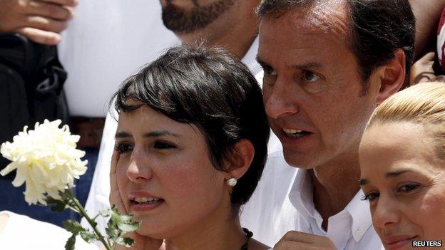 Former Bolivian president Jorge Quiroga (C) speaks to Patricia Ceballos (L), mayor of San Cristobal and wife of jailed former mayor Daniel Ceballos, next to Lilian Tintori, wife of jailed Venezuelan opposition leader Leopoldo Lopez, during a rally against the government of Venezuela"s President Nicolas Maduro and in support of the political leaders in prison, in Caracas May 30, 2015.