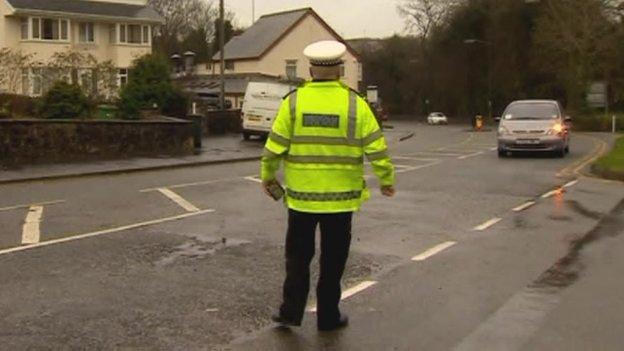 Police officer stops a motorist