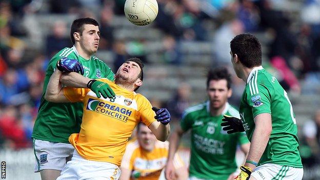 Fermanagh's Mickey Jones challenges Antrim opponent Conor Murray in the Ulster SFC game at Brewster Park