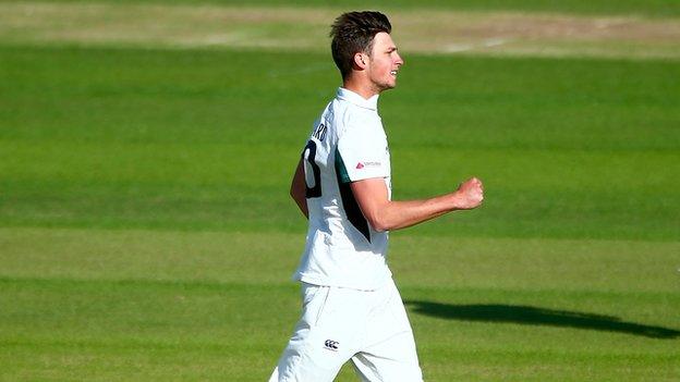 Ed Barnard celebrates taking his maiden first-class wicket, Hampshire opener Liam Dawson