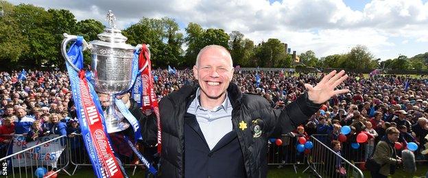 John Hughes poses with the Scottish Cup