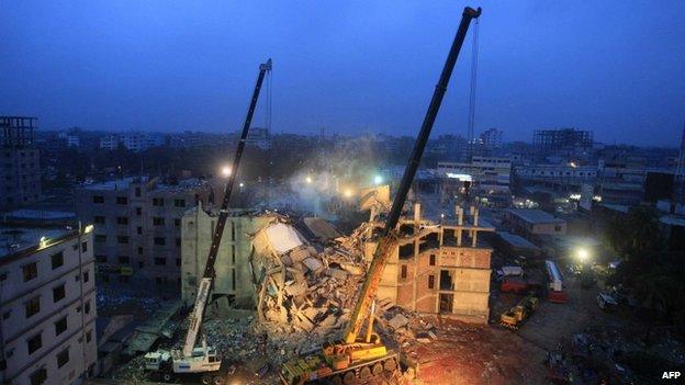 Cranes operated by Bangladeshi army personnel at the scene of the Rana Plaza disaster (29 April 2013)