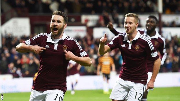 Former Hearts striker James Keatings (left) has signed a two-year deal with Edinburgh rivals Hibernian