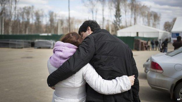 A couple at a migrant registration centre near Moscow, Russia (22 April 2015)