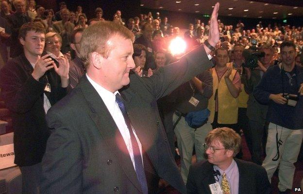 Leader of the Liberal Democrats Charles Kennedy waves to the crowd after delivering his keynote speech on the final day of the Liberal Democrat Party Conference in Harrogate, 1999