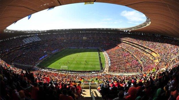 Fans watch the game on 14 June 2010, during the 2010 World Cup match Netherlands and Denmark at Soccer City Stadium in Soweto, suburban Johannesburg