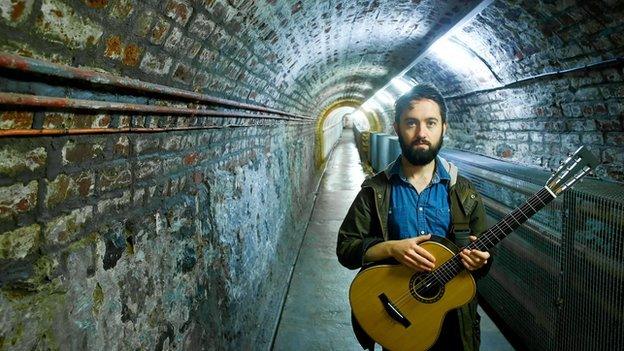 Villagers' Conor O'Brien in the tunnel at Crumlin Road Gaol.