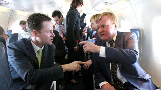 Nick Clegg ad Charles Kennedy on a flight during the 2010 election campaign