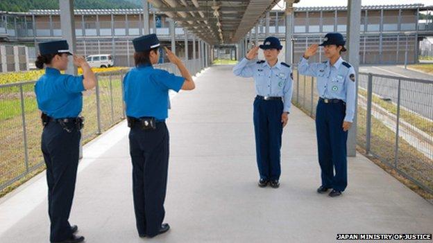 An archive photo of four female guards in uniform at the prison