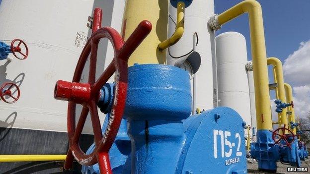 Valves and pipes are seen at a gas compressor station in the village of Boyarka