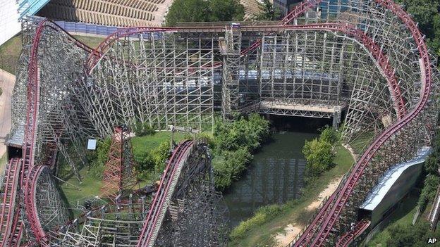 This aerial photo shows the Texas Giant roller coaster at Six Flags Over Texas where a woman fell to her death, in Arlington, Texas