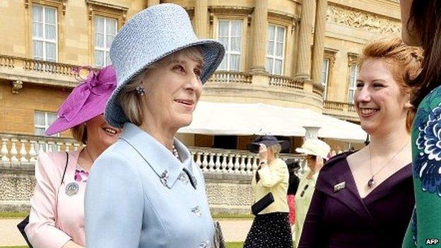 Duchess of Gloucester meets guests during a garden party in honour of the centenary of the Women's Institute at Buckingham Palace