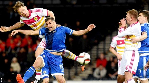 Christophe Berra (left) scored the winner in Scotland's March friendly with Northern Ireland