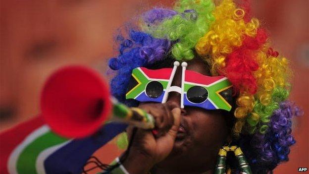 South Africa supporter blows a vuvuzela prior to the start of the Group F first round 2010 World Cup football match Paraguay vs. New Zealand on June 24, 2010 at Peter Mokaba stadium in Polokwane