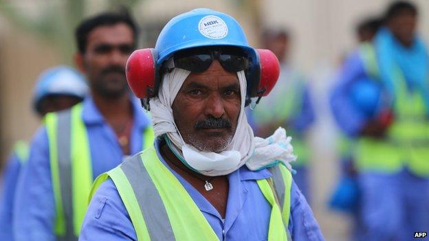 Foreign labourers working on the construction site of the al-Wakrah football stadium, one of Qatar's 2022 World Cup stadiums (May 4, 2015)