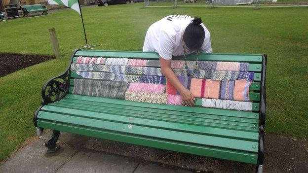 St John's Church bench covered in knitting