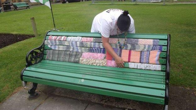 St John's Church bench covered in knitting