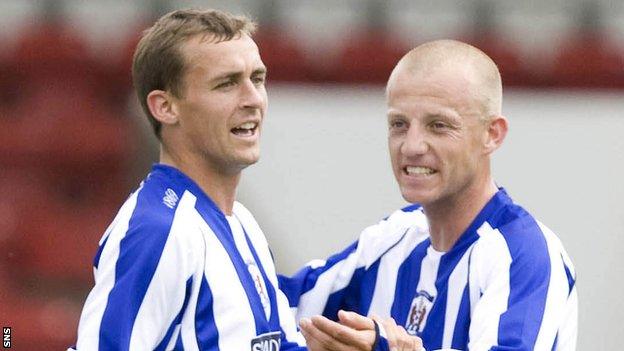 James Fowler and Gavin Skelton celebrate with Kilmarnock