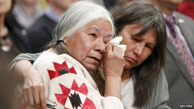 Attendees embrace during the Truth and Reconciliation Commission of Canada closing ceremony at Rideau Hall in Ottawa 3 June 2015