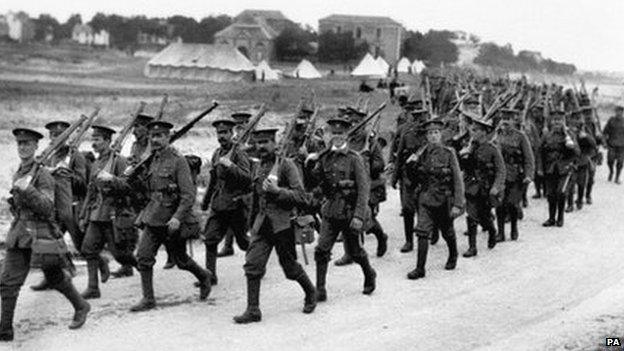 British infantrymen marching towards the front lines in the River Somme valley