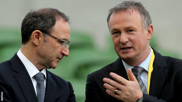 Republic manager Martin O'Neill with Northern Ireland's Michael O'Neill