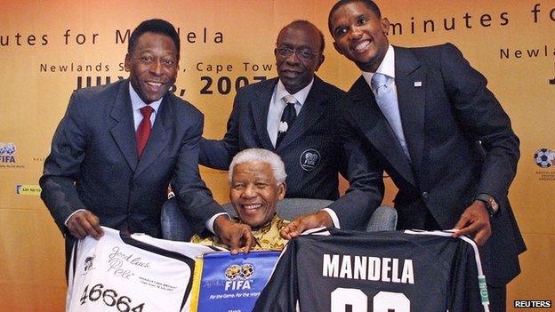 Warner with Pele, Nelson Mandela and Samuel Eto