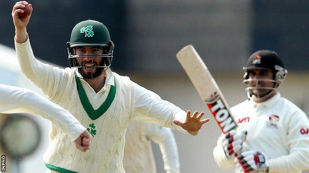 Ireland's Andrew Balbirnie celebrates taking a catch