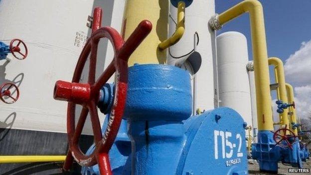 Valves and pipes are seen at a gas compressor station in the village of Boyarka