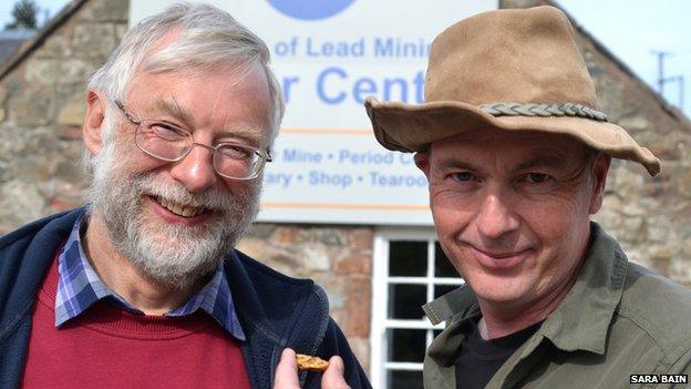 Wanlockhead Museum of Lead Mining Trustee Gerard Godfrey and gold panning expert Leon Kirk with the 18.1 golden nugget found in a burn close to Wanlockhead.