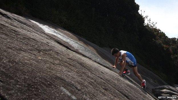 A competitor in a race on Mount Kinabulu