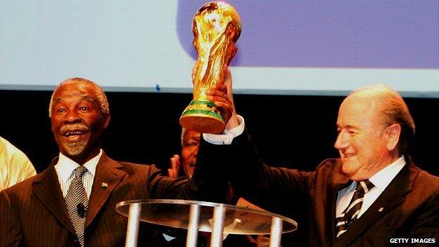 Thabo Mbeki (left) lifts the World Cup aloft with former Fifa President Sepp Blatter in Berlin, Germany - 7 July 2006