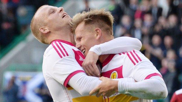 Steven Naismith and Matt Ritchie celebrate against Qatar