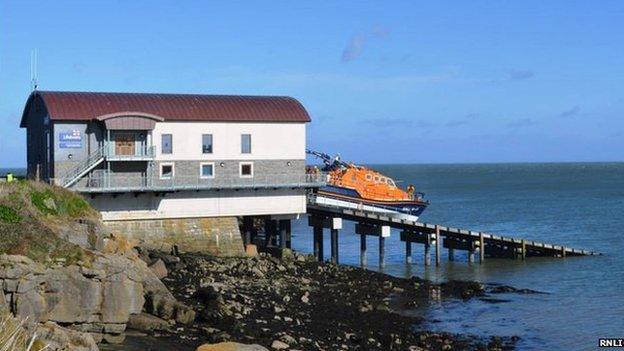 The new Moelfre RNLI lifeboat station with the lifeboat Kiwi on the slipway