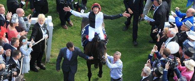 Frankie Dettori celebrates Epsom Derby win