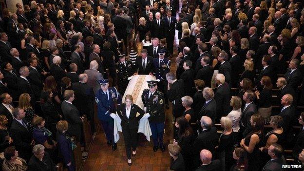 A procession carrying the casket leaves the church after the funeral of former Delaware Attorney General Beau Biden (06 June 2015)