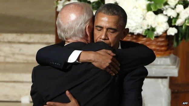 President Obama (right) hugs Vice President Joe Biden during the funeral service (06 June 2015)