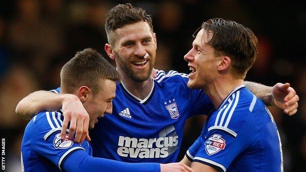 Daryl Murphy (centre) celebrates scoring for Ipswich