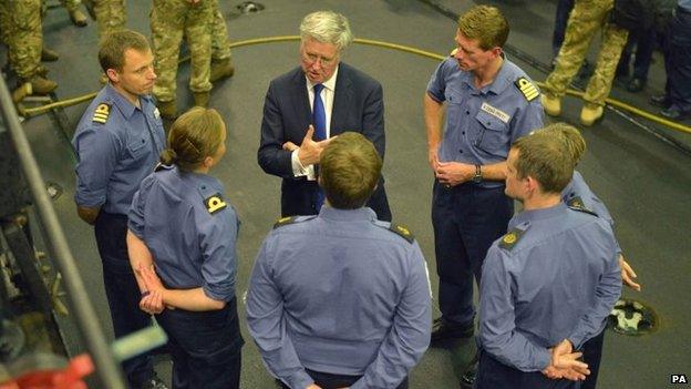 Michael Fallon talks to crew of HMS Bulwark