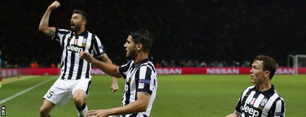 Alvaro Morata (centre) celebrates his goal with Andrea Barzagli and Stephan Lichtsteiner