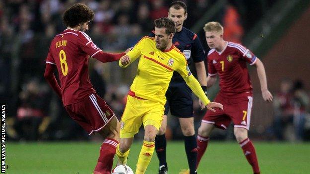 Wales midfielder Aaron Ramsey tussles with Belgium's Marouane Fellaini during the 0-0 draw in November 2014