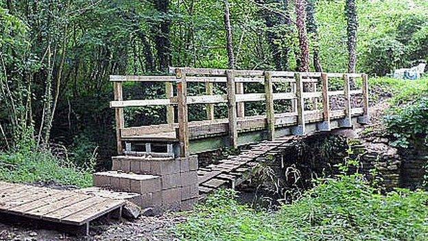 Wooden bridge over the River Lyd