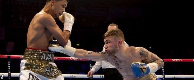 Carl Frampton (right) hits Chris Avalos