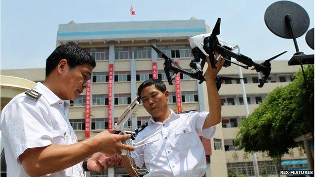 A drone is used to detect radio signals to prevent students from cheating Students take the "Gaokao" college entrance exam, China - 7 Jun 2015 The latest weapon in the fight against cheating for China"s all-important college entrance exam is a six-propeller drone. It flew over two testing centers in Luoyang city in central China"s Henan province to scan for any unusual signals being sent to devices smuggled by students taking the annual test. Almost all Chinese high school graduates must take the test, and their scores are the key criterion for which tier of university they can enter.