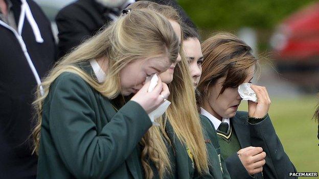 Mourners at Ronan Hughes's funeral