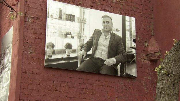 Photographs celebrating document the social history of migrant communities being exhibited on the streets of Birmingham