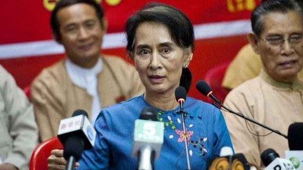 Aung San Suu Kyi talks at an NLD meeting in Rangoon