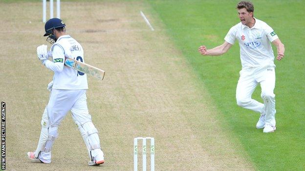 Craig Meschede of Glamorgan celebrates the wicket of Alex Hughes of Derbyshire