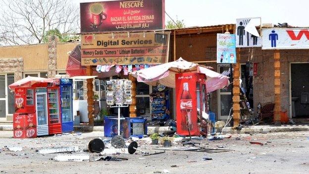 Debris is seen near shops damaged during a foiled suicide attack in Luxor, Egypt, June 10, 2015