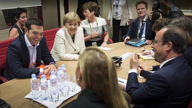 Alexis Tsipras (L) with Angela Merkel and Francois Hollande